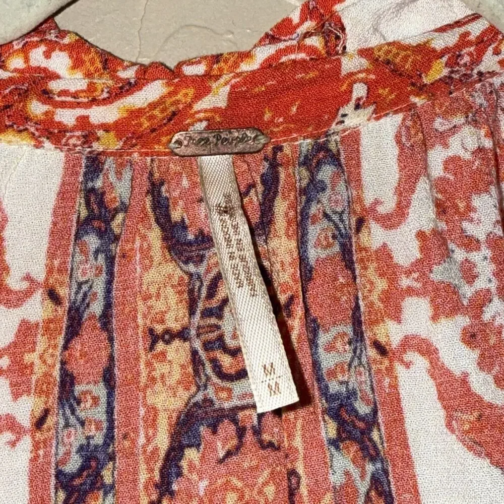 Free People Magic Mystery Tunic with bell sleeves split neck button front size M